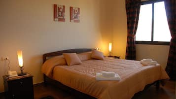 Camas con pillow-top, escritorio, camas extra y wifi gratis