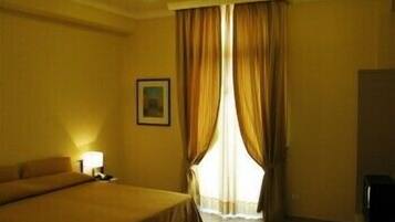 Classic Double Room, 1 Double or 2 Single Beds | Frette Italian sheets, pillow-top beds, in-room safe, desk