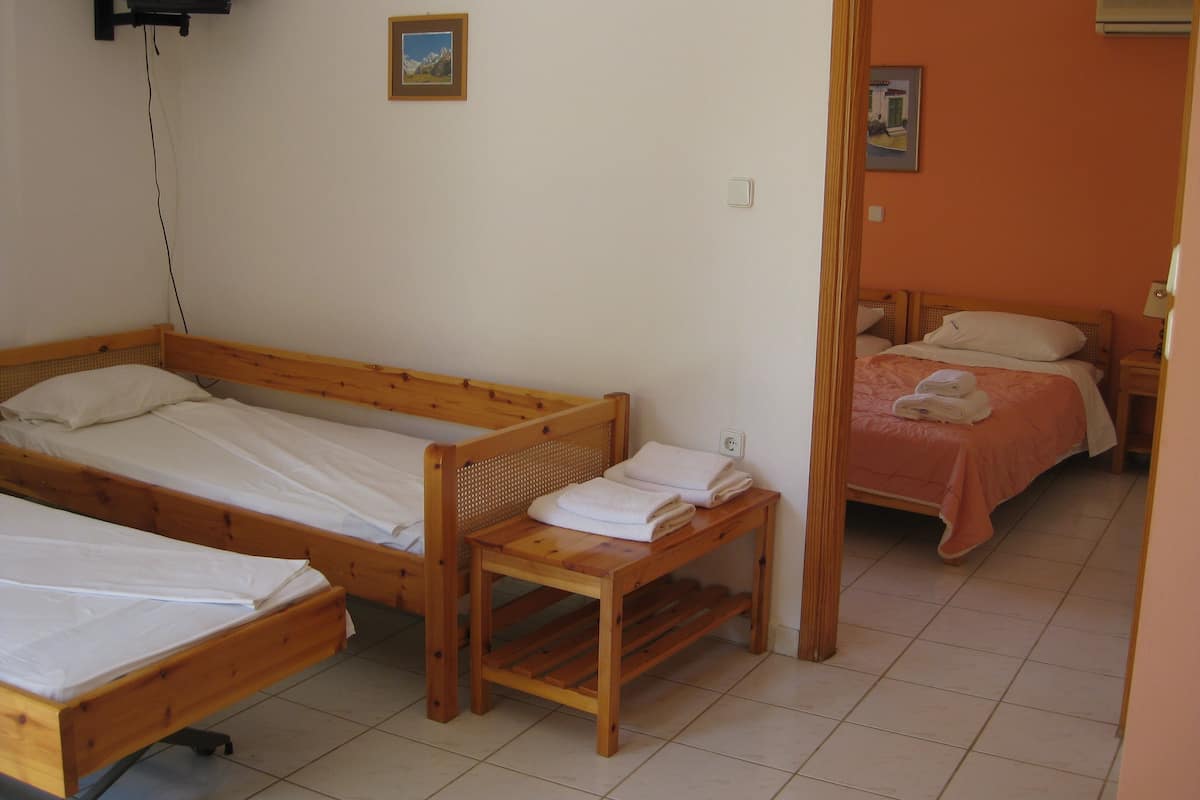 quadruple room | 1 bedroom, tempur-pedic beds, in-room safe, iron/ironing board