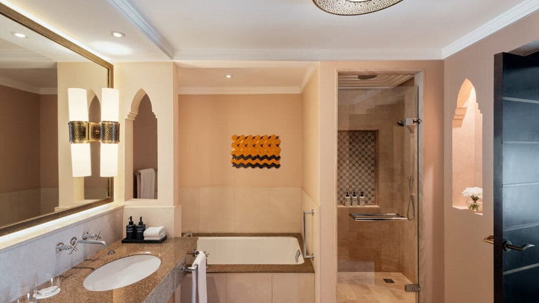 separate bathtub and shower, deep-soaking bathtub, rainfall showerhead