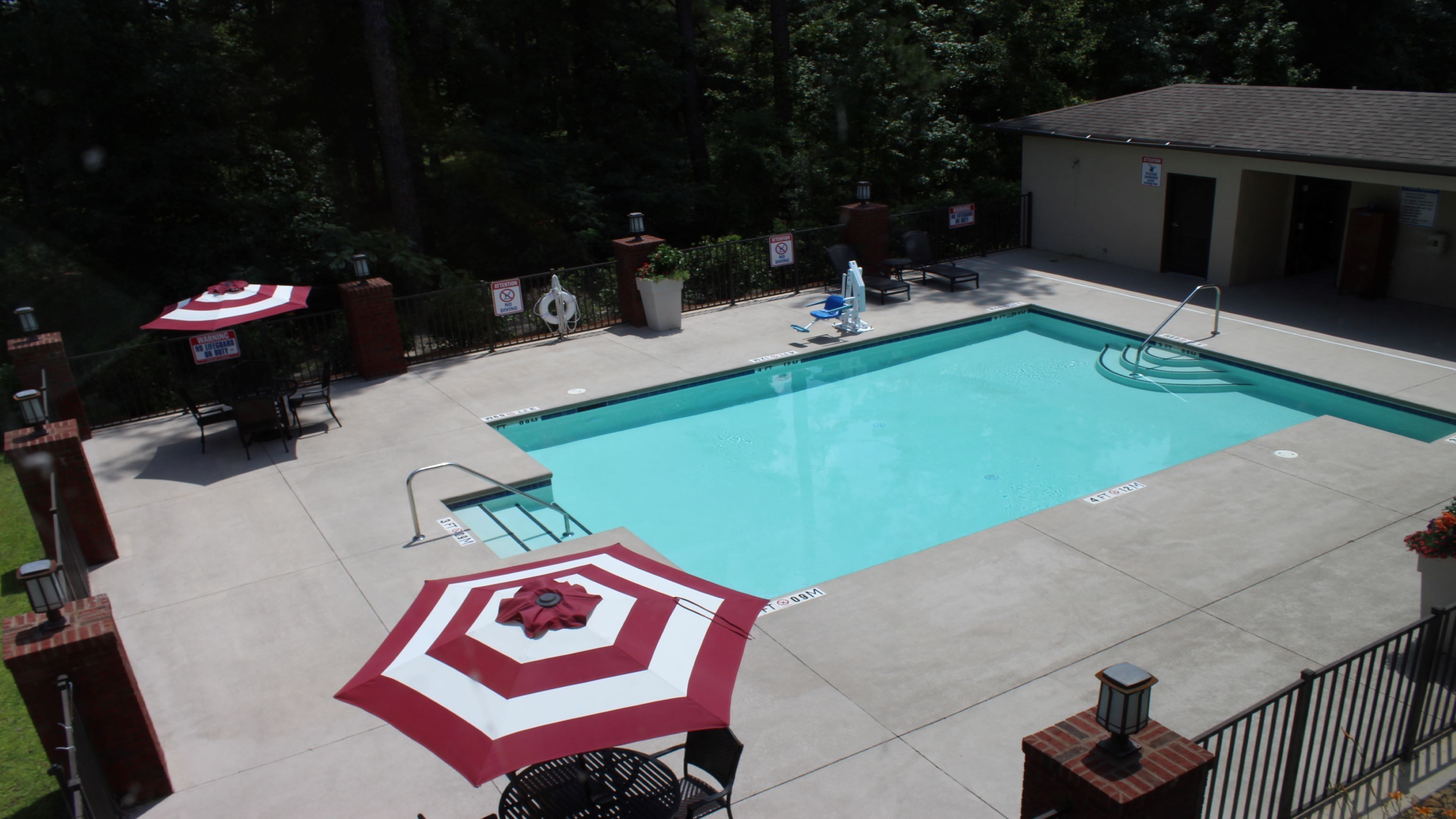 seasonal outdoor pool, open 10:00 am to 10 pm, pool umbrellas