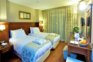 Ropa de cama de alta calidad y minibar 