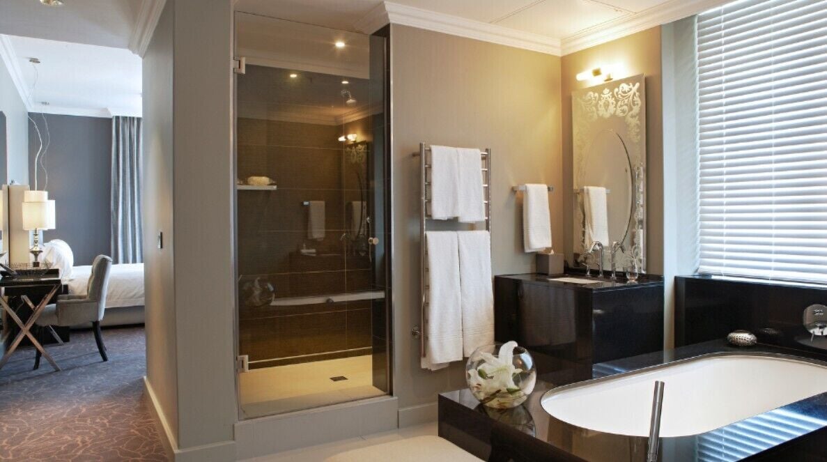 premium room, 1 king bed, mountain view | bathroom | separate bathtub and shower, deep-soaking bathtub, designer toiletries