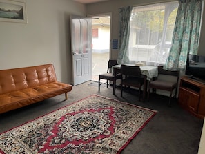 Standard Room, Kitchen (2 Bedroom Unit) | Living area | 40-inch flat-screen TV with cable channels, TV, DVD player