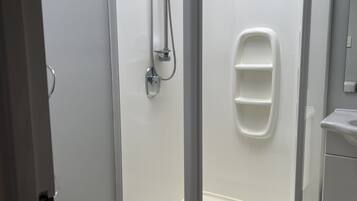 Shower, free toiletries, hair dryer, towels