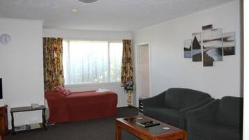 Standard Room, Kitchen (1 Bedroom Suite) | Living area | 40-inch flat-screen TV with cable channels, TV, DVD player