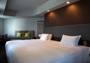 Down duvets, pillow-top beds, desk, blackout curtains