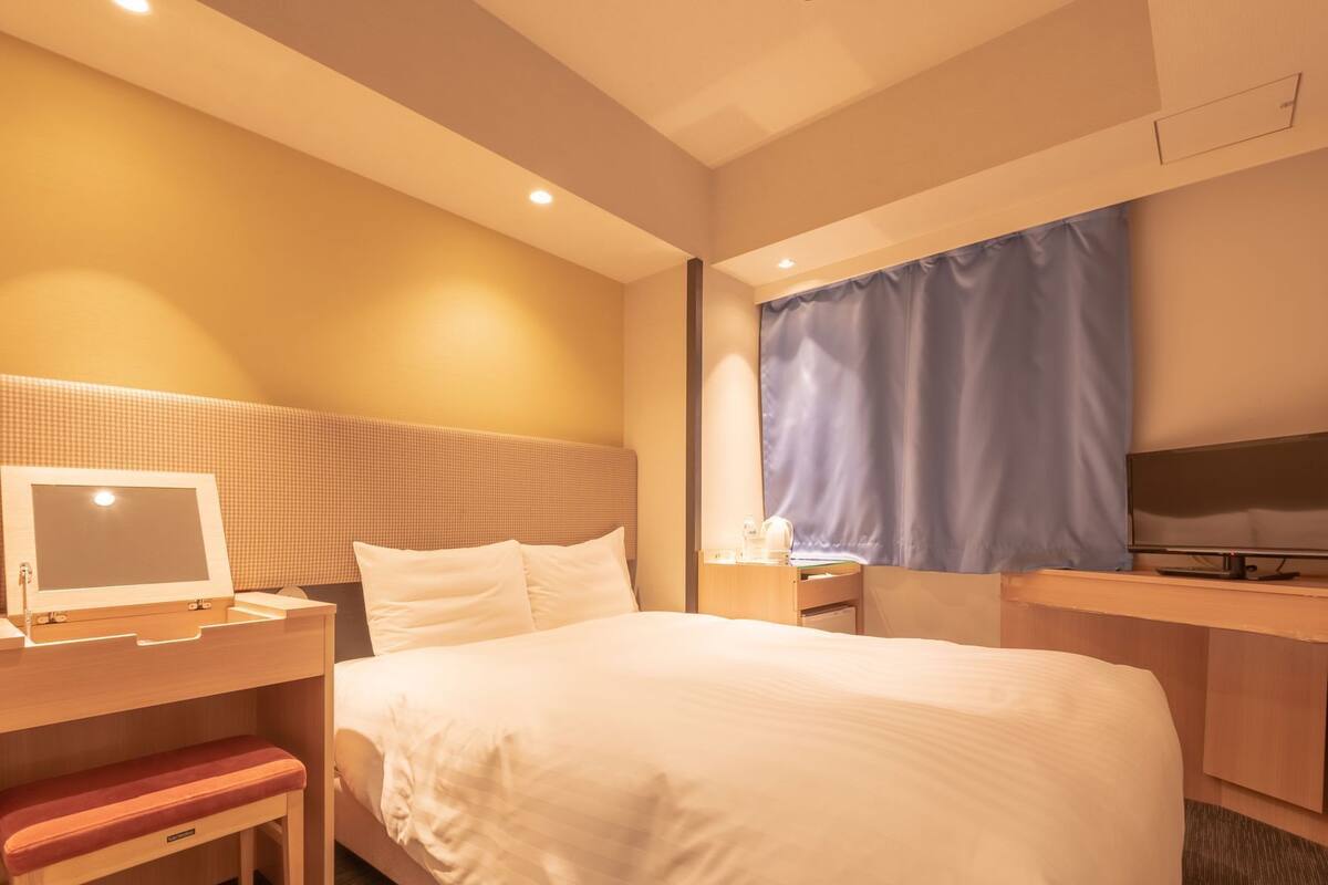 Down duvets, pillow-top beds, desk, blackout curtains