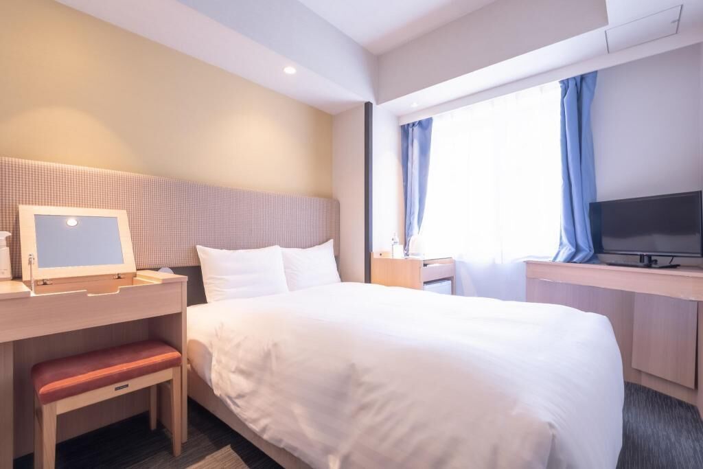 Down duvets, pillow-top beds, desk, blackout curtains