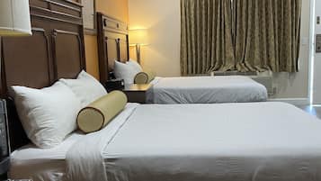 Hypo-allergenic bedding, down comforters, laptop workspace