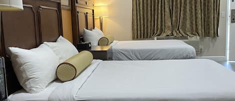 Hypo-allergenic bedding, down comforters, laptop workspace