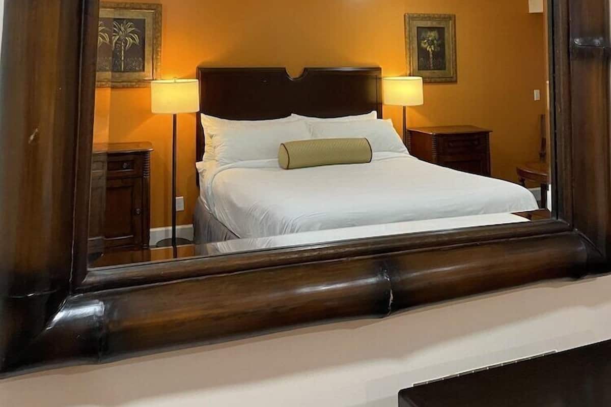 Hypo-allergenic bedding, down duvets, laptop workspace