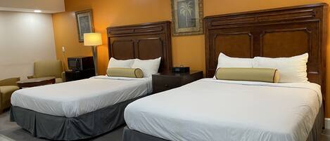 Hypo-allergenic bedding, down duvets, laptop workspace
