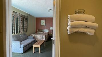 Hypo-allergenic bedding, down duvets, laptop workspace