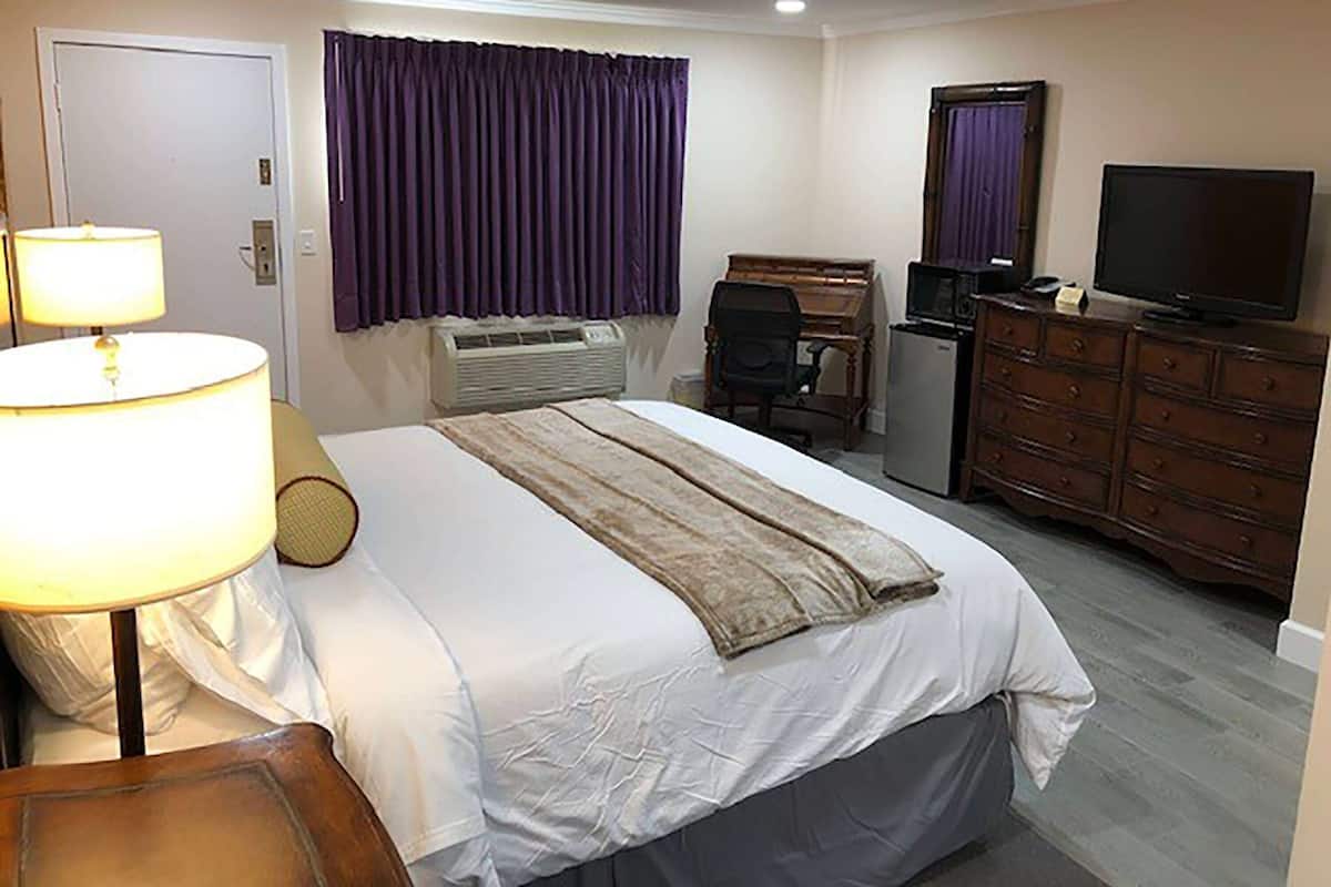 Hypo-allergenic bedding, down comforters, laptop workspace
