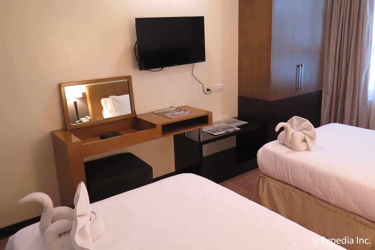 Habitación Deluxe con 2 camas individuales | 1 habitación, ropa de cama de alta calidad y minibar