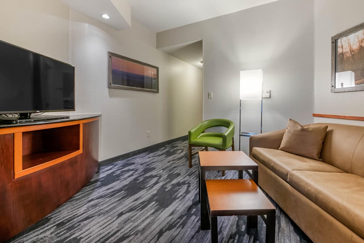 premium bedding, desk, blackout curtains, iron/ironing board