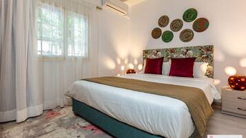 Familienzimmer, 2 Schlafzimmer, Gartenblick | Zimmersafe, individuell dekoriert, individuell eingerichtet