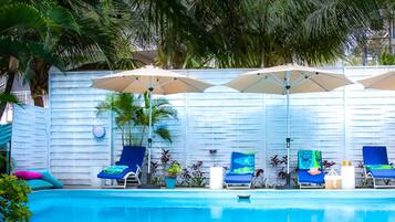 Outdoor pool, pool umbrellas, pool loungers