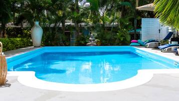 Outdoor pool, pool umbrellas, sun loungers