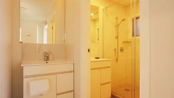 Superior Family Room | Bathroom | Shower, hair dryer, towels, soap