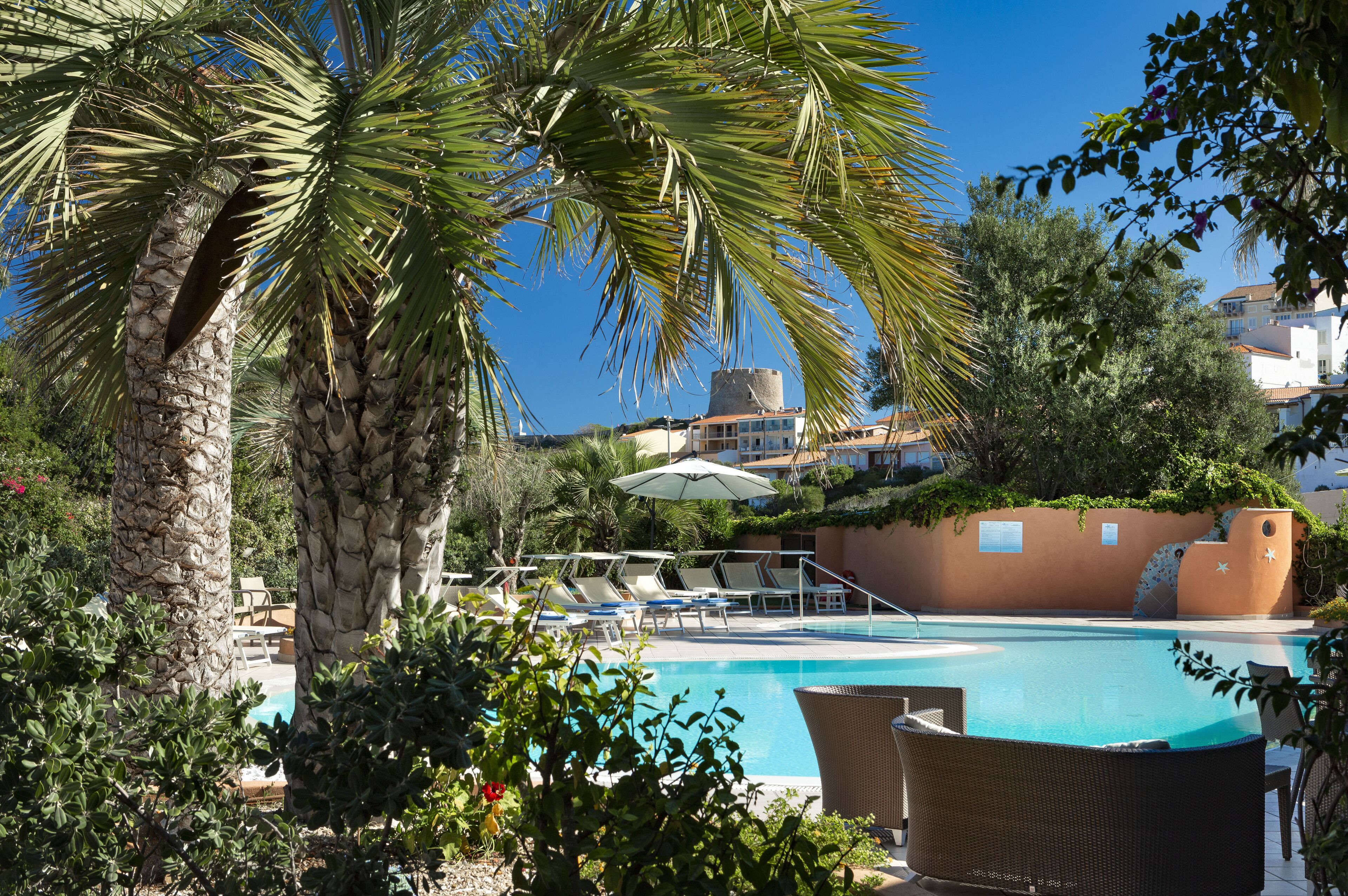 outdoor pool, pool umbrellas, pool loungers