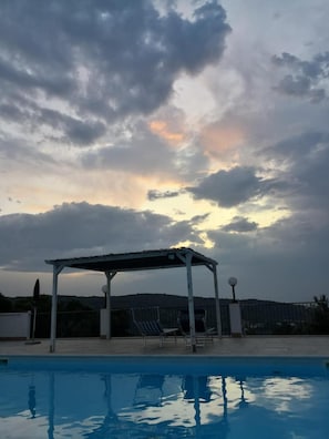 Seasonal outdoor pool, pool umbrellas, sun loungers