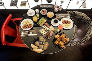 Daily buffet breakfast (EUR 22 per person)