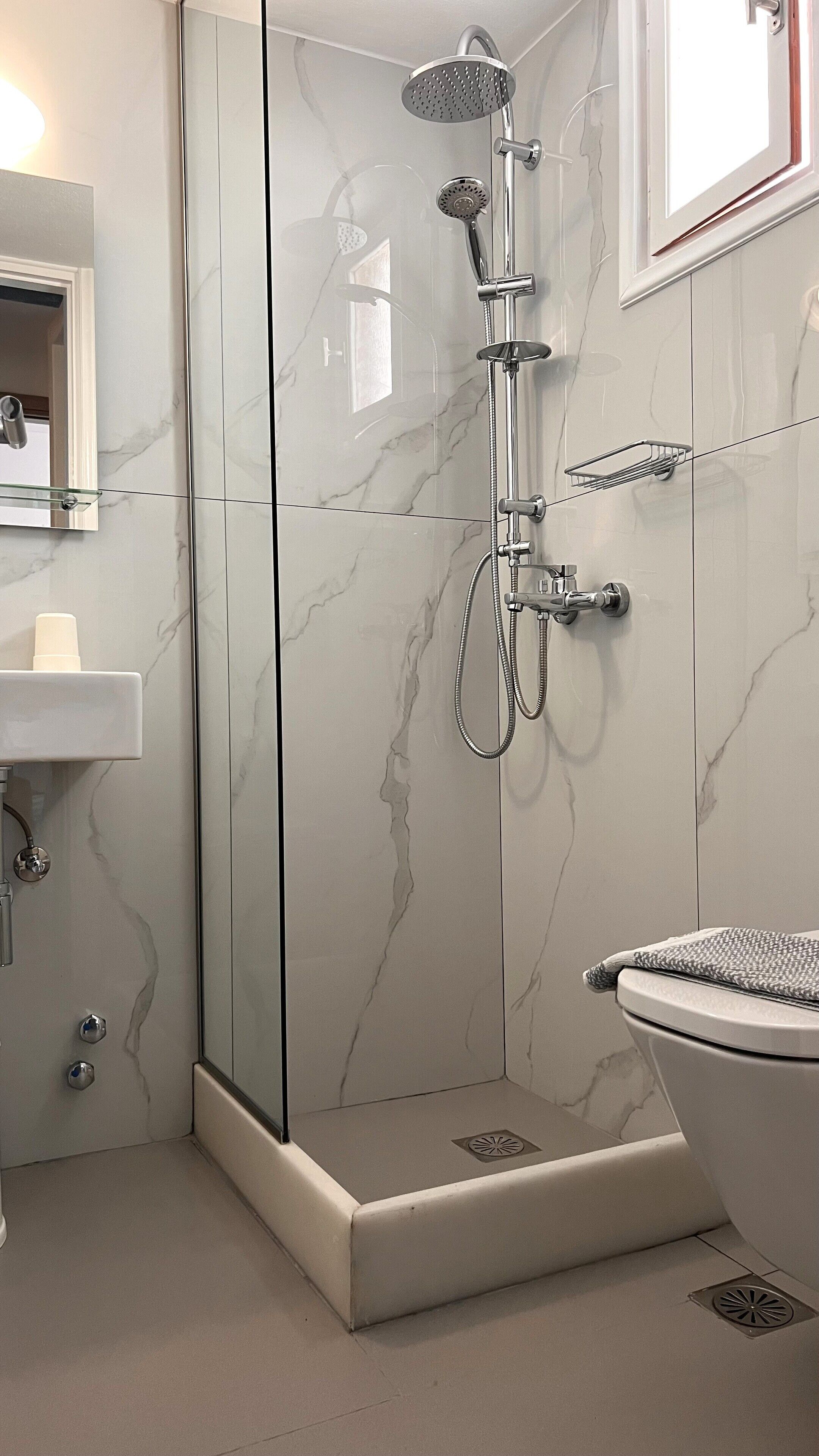 standard room | bathroom | shower, hair dryer, towels, soap