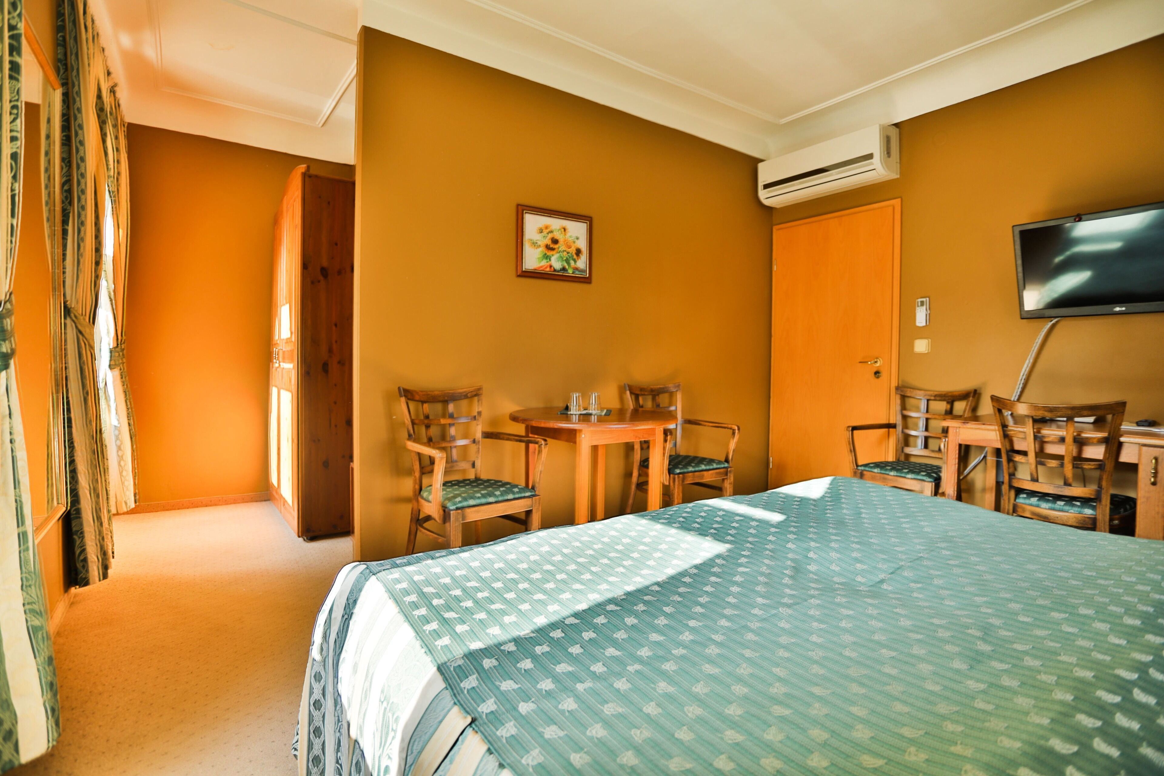 double or twin room | in-room safe, desk, laptop workspace, blackout curtains