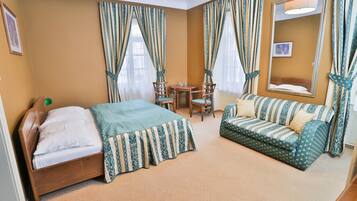 Suite | In-room safe, desk, laptop workspace, blackout curtains