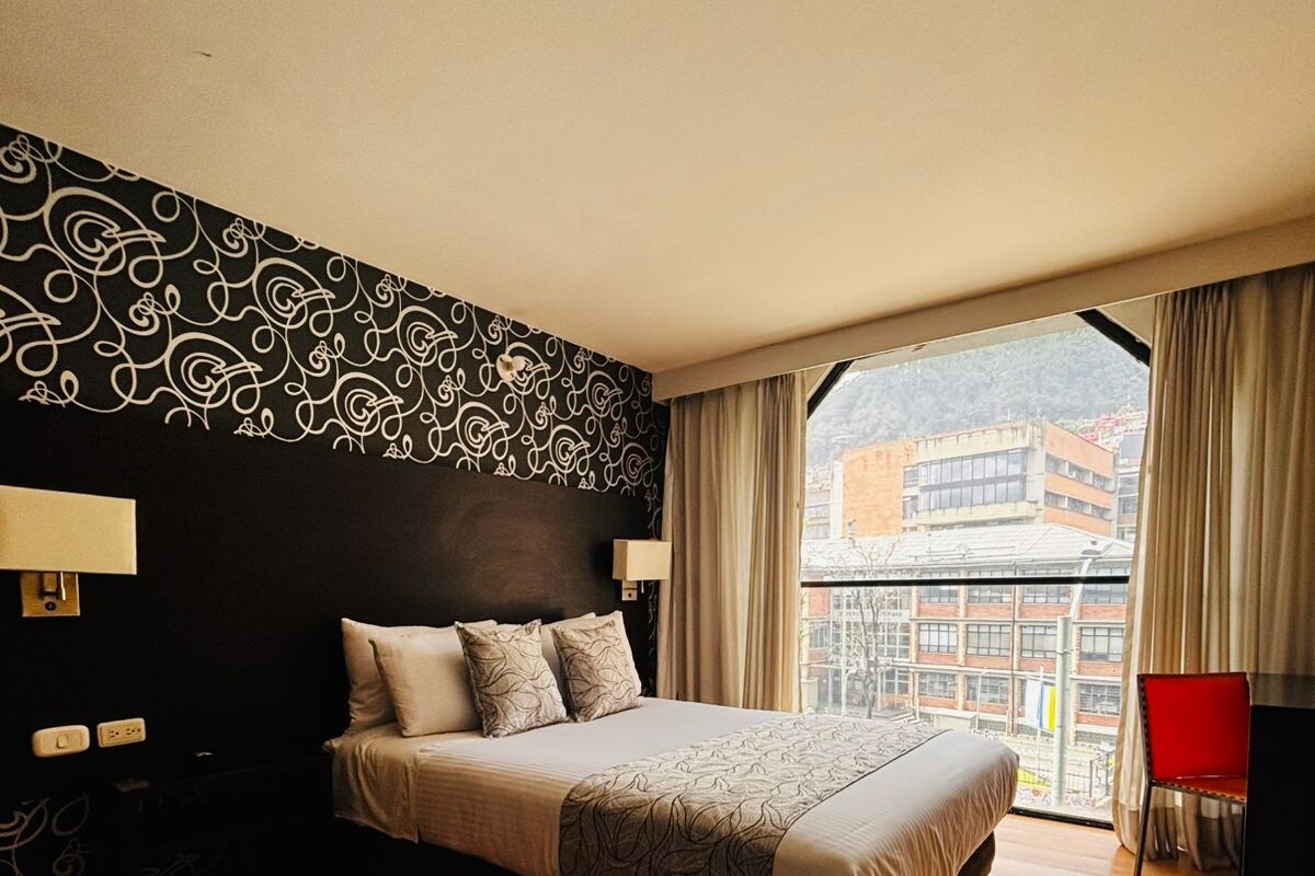 Pillow-top beds, in-room safe, desk, iron/ironing board (on request)