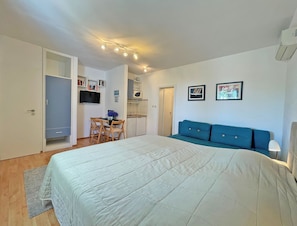 Standard Apartment, Terrace, Sea View | Pillowtop beds, desk, free WiFi, bed sheets