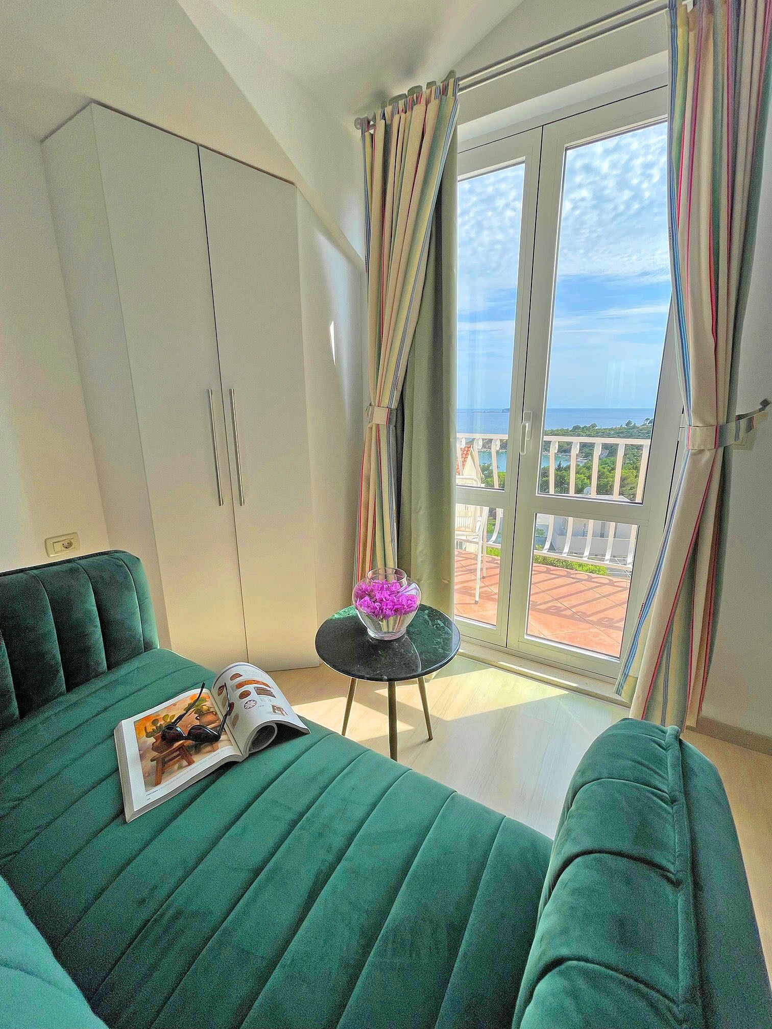 Deluxe Apartment, 2 Bedrooms, Terrace, Sea View | Living area | 32-inch TV with satellite channels