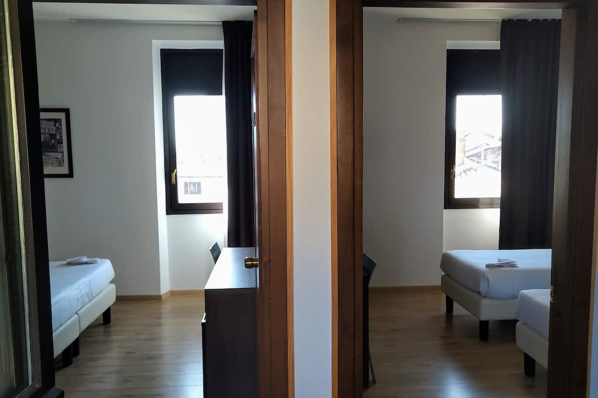 Quadruple Room | 1 bedroom, memory foam beds, in-room safe, desk