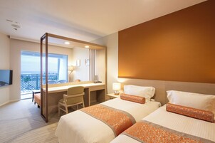 Premium bedding, down comforters, in-room safe, desk