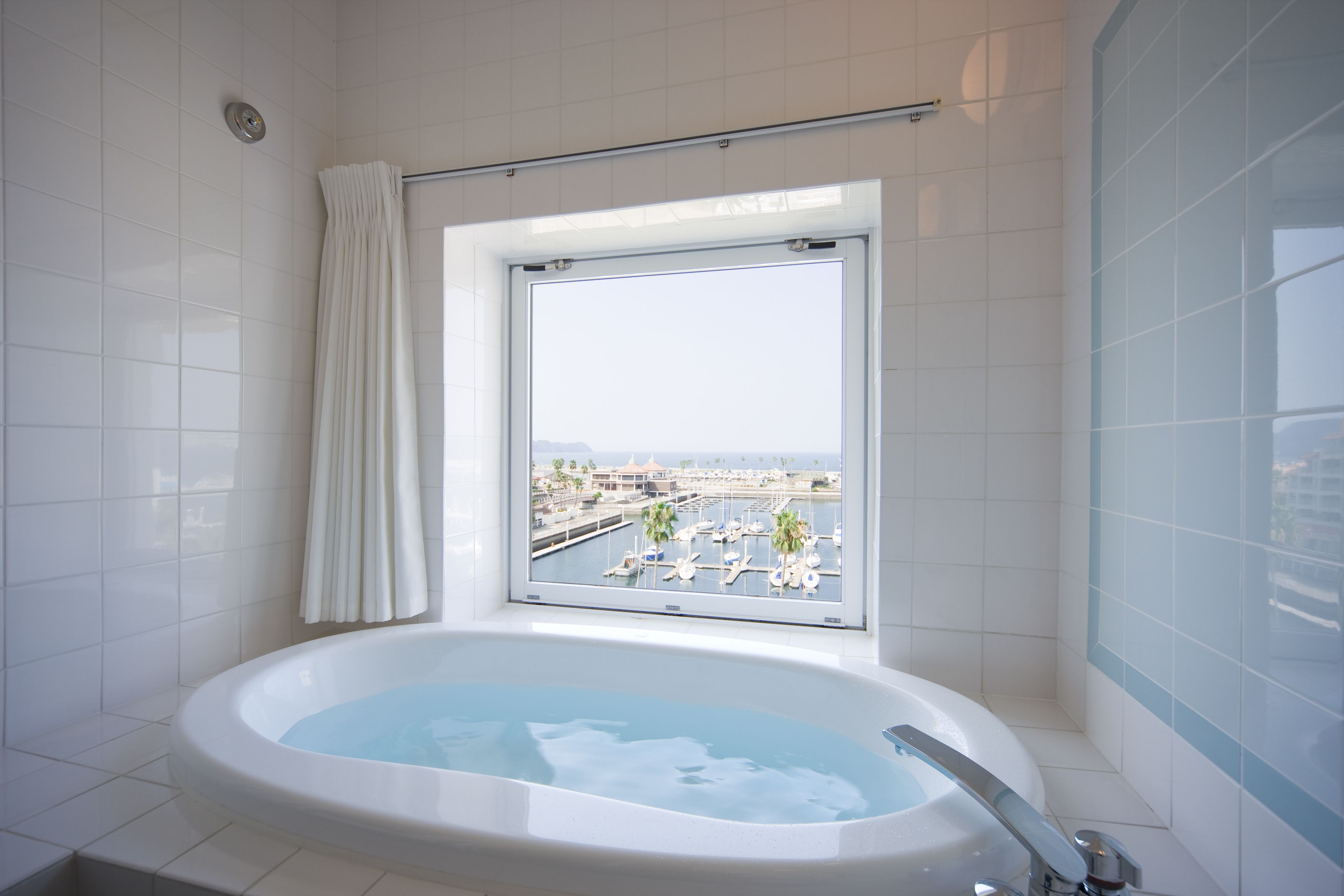 separate bathtub and shower, free toiletries, hair dryer, slippers