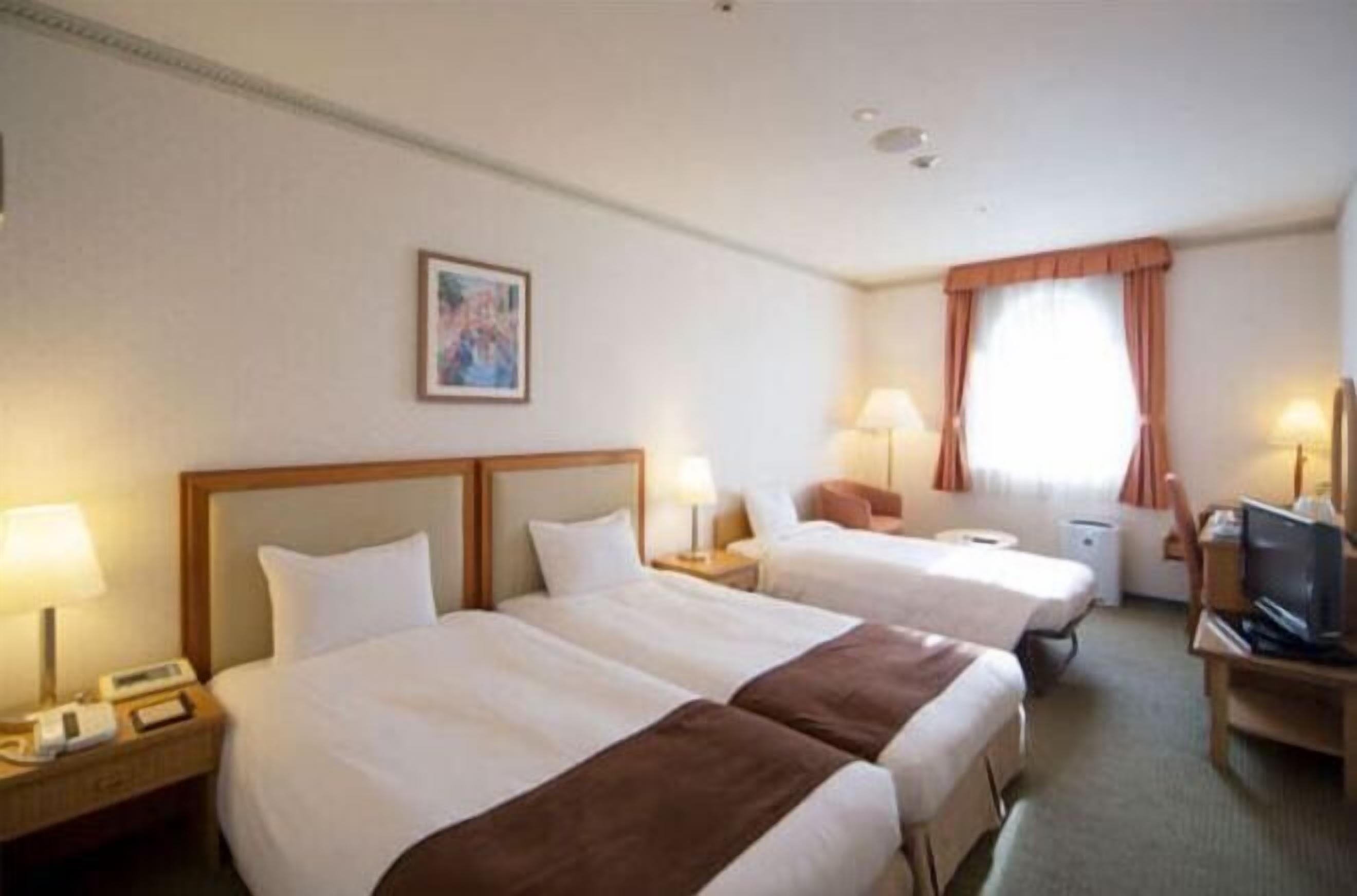 Premium bedding, down duvets, in-room safe, desk