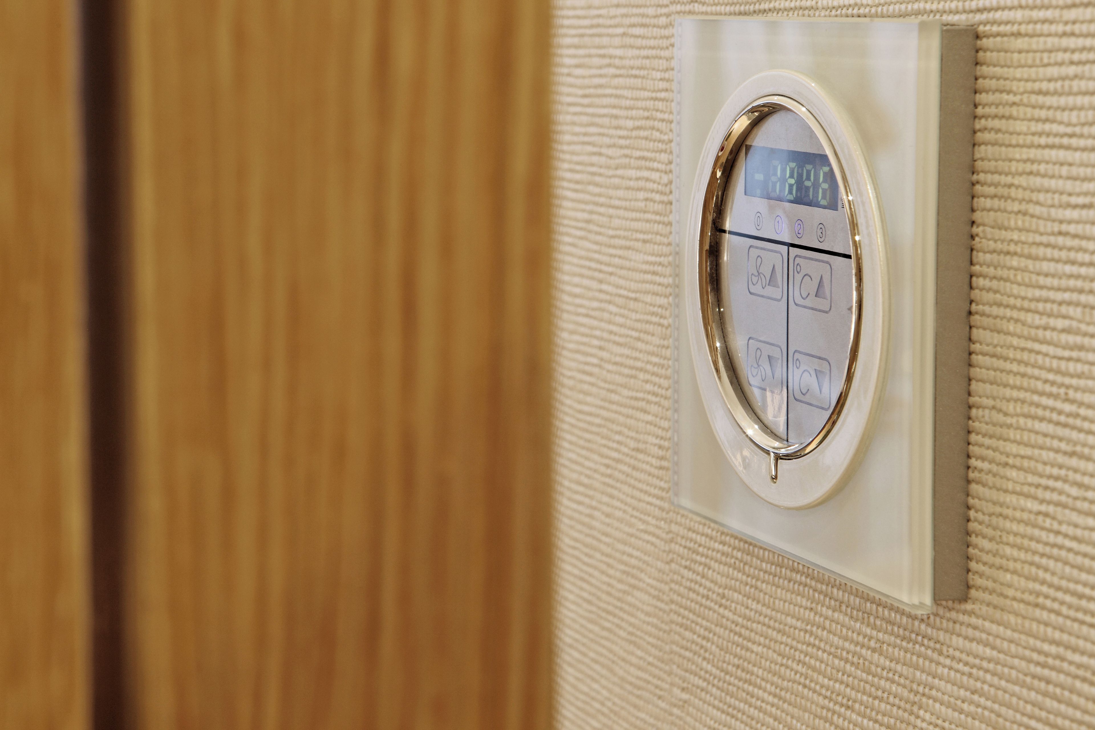 A thermostat with temperature settings and a timer.