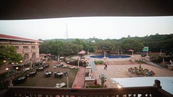 Relax in our serene courtyard, surrounded by a tranquil fountain and comfortable seating areas.