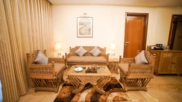 Valley View Suite | Living area | 55-inch Smart TV with cable channels