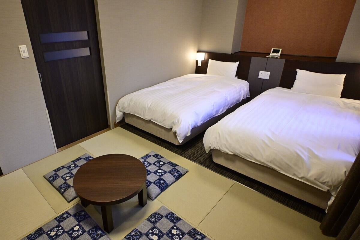 Premium bedding, down duvets, iron/ironing board (on request), free WiFi