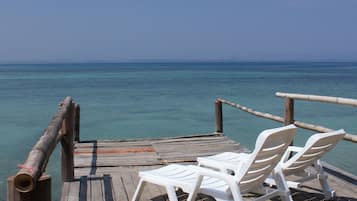 Private beach, white sand, beach towels, beach massages