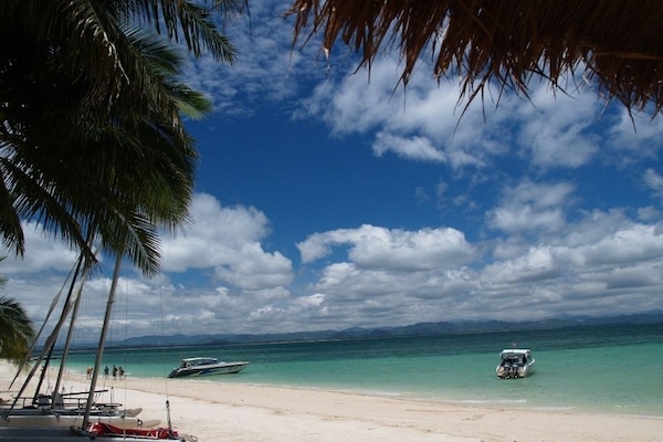 Private beach, white sand, beach towels, beach massages