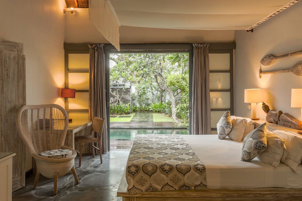 deluxe villa, 2 bedrooms, pool view | minibar, in-room safe, individually decorated, individually furnished