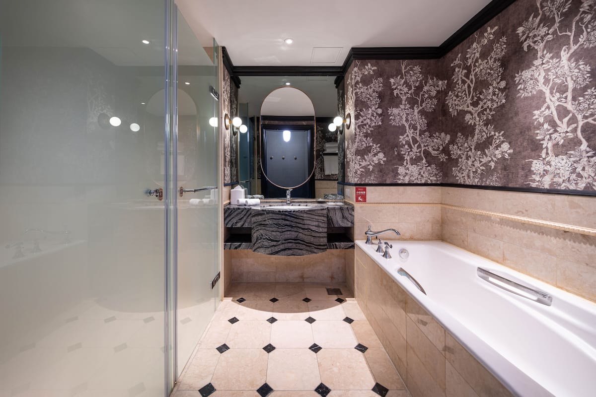 discovery garden room | bathroom | separate bathtub and shower, deep-soaking bathtub, rainfall showerhead