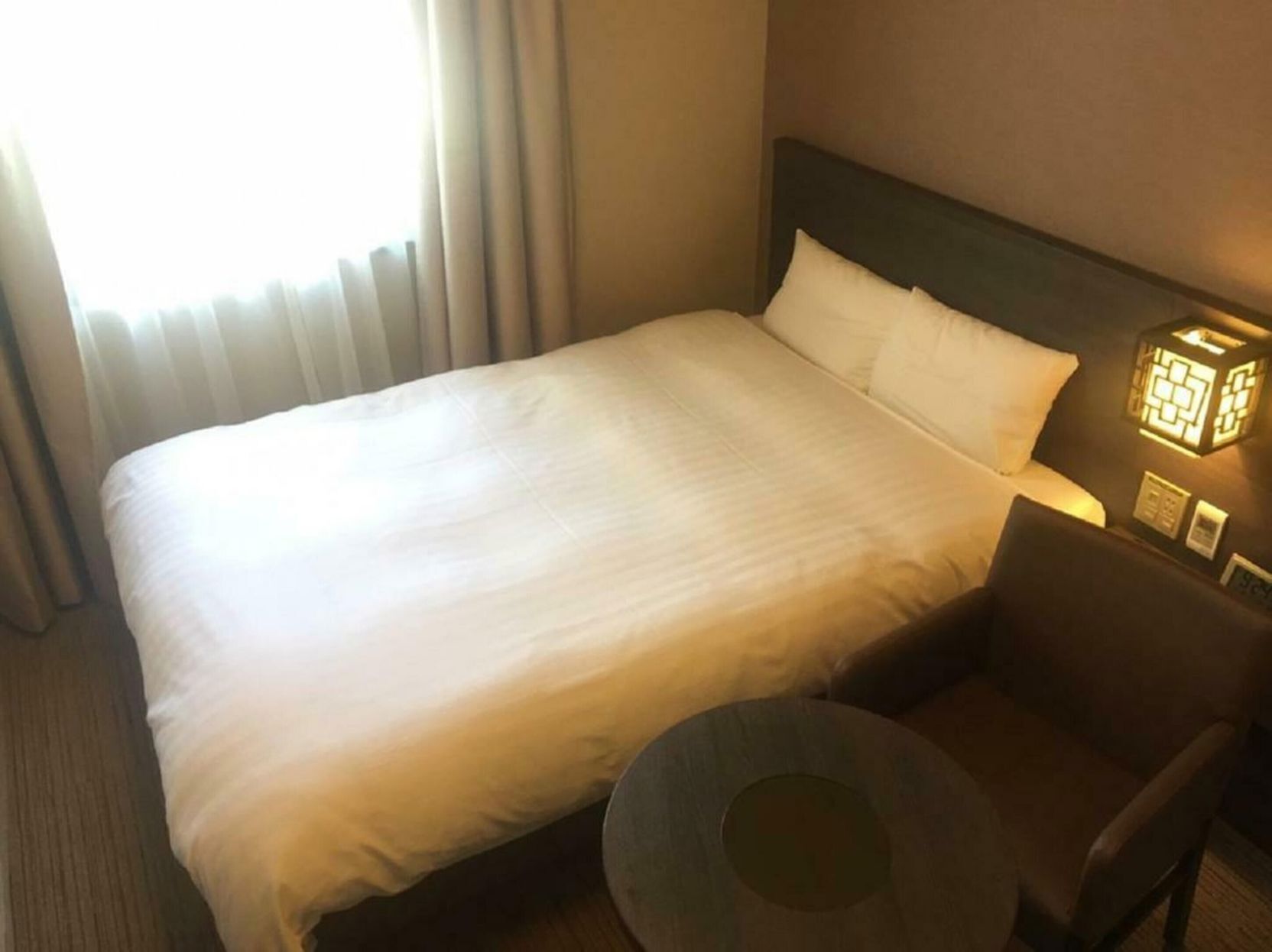 Premium bedding, down duvets, blackout curtains, iron/ironing board
