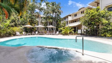 Outdoor pool, pool umbrellas, sun loungers