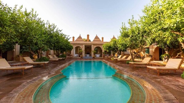 Outdoor pool, sun loungers