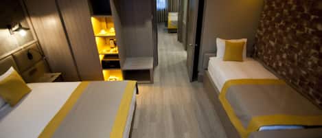 Habitació estàndard | Llençols de cotó egipci, roba de llit d'alta qualitat i minibar